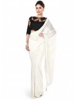 white_saree_matched_with_black_embellished_blouse